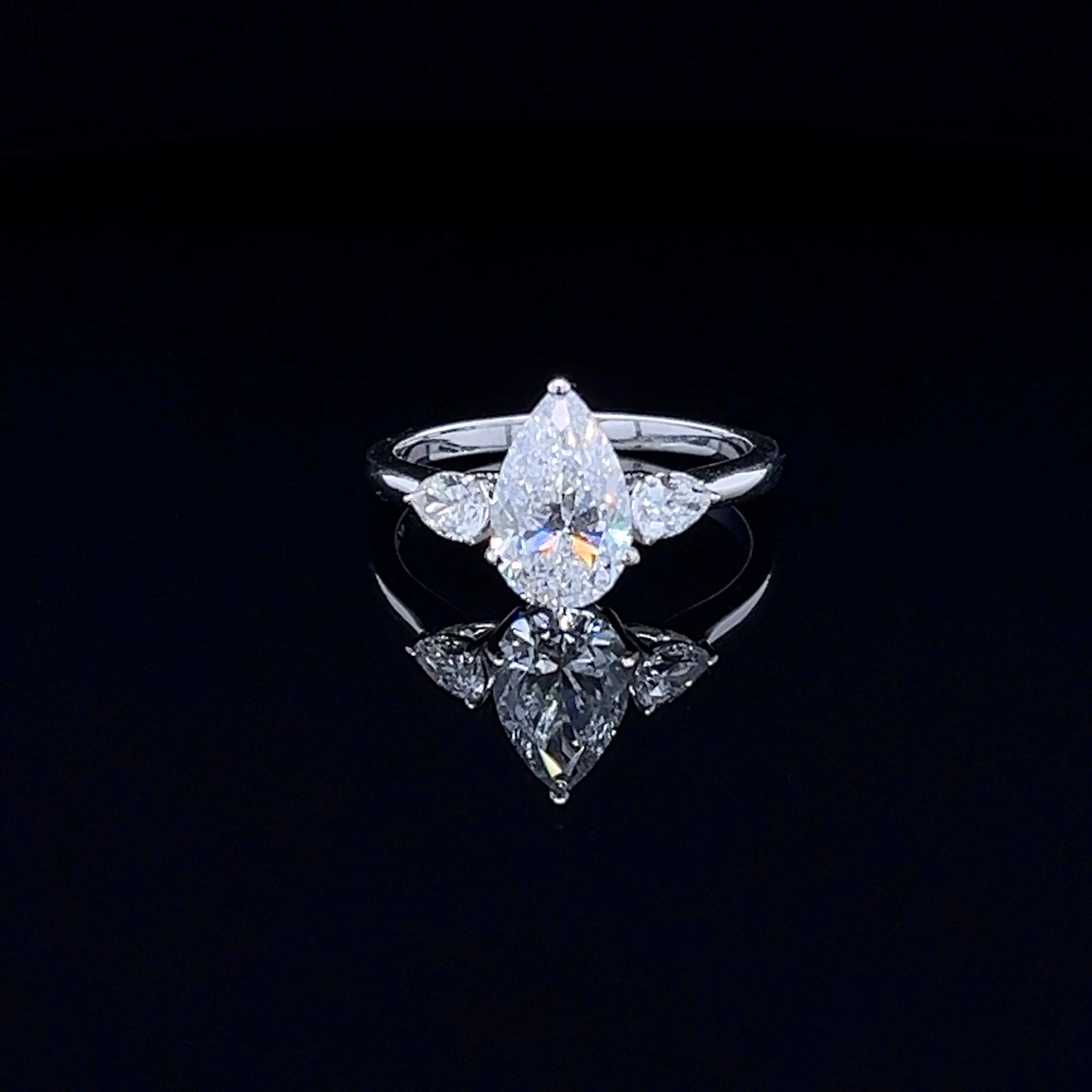 1.50 Carat Classic Pear-Shaped Tripology Three-Stone Ring