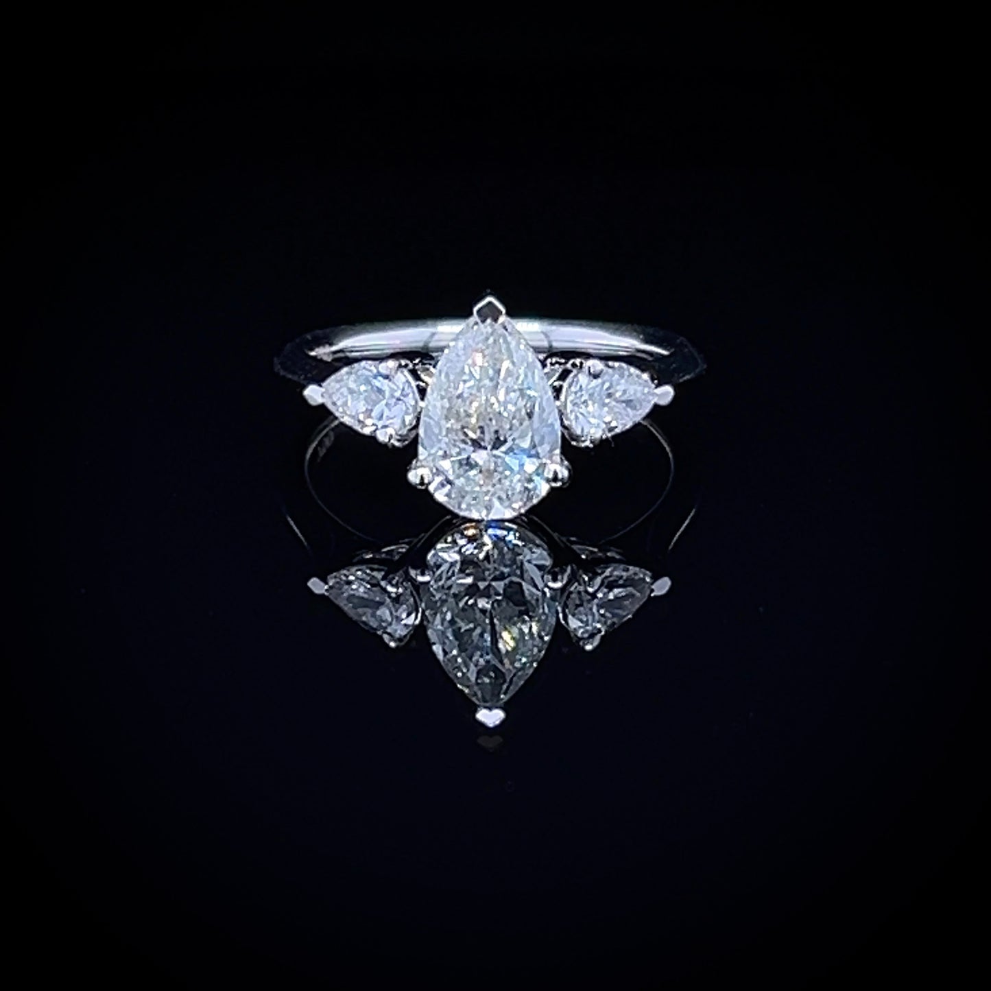 1.50 Carat Classic Pear-Shaped Tripology Three-Stone Ring