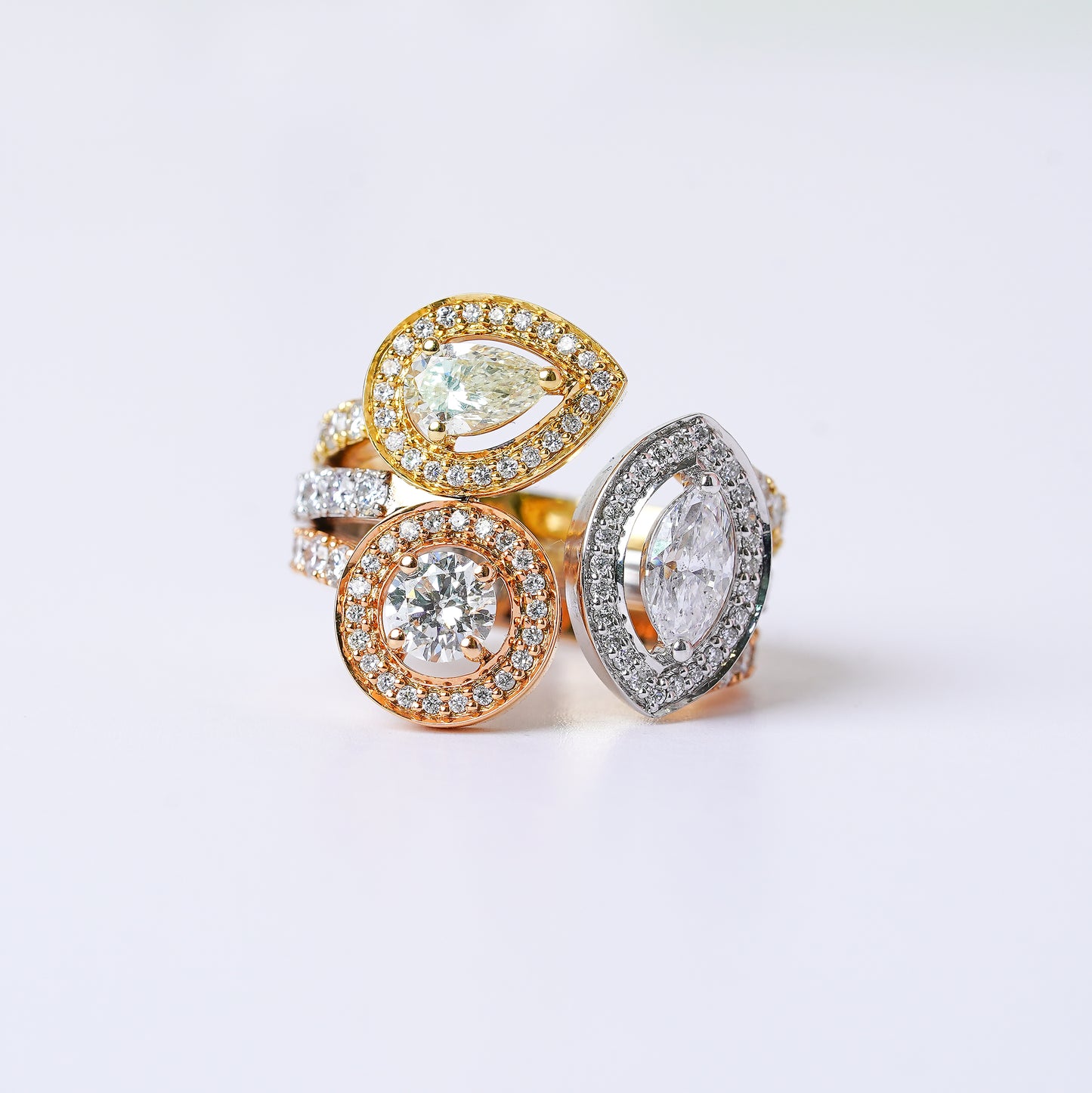 PEAR MARQUISE & ROUND DIAMOND RING
