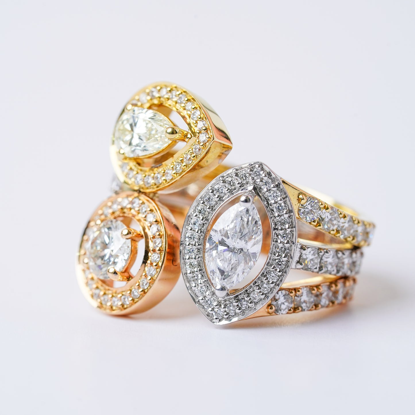 PEAR MARQUISE & ROUND DIAMOND RING