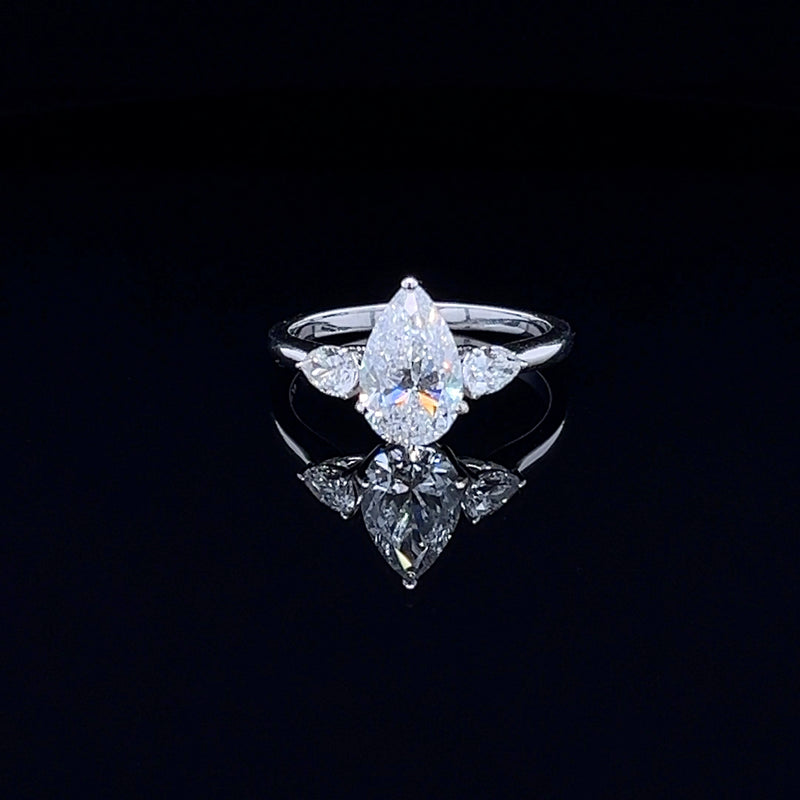 1.50 Carat Classic Pear-Shaped Tripology Three-Stone Ring