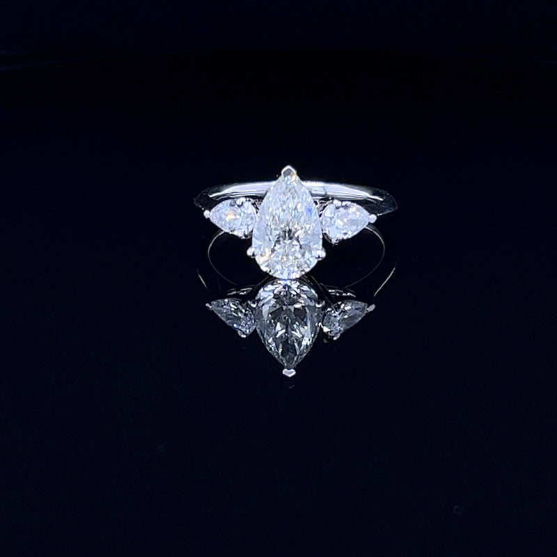 1.50 Carat Classic Pear-Shaped Tripology Three-Stone Ring