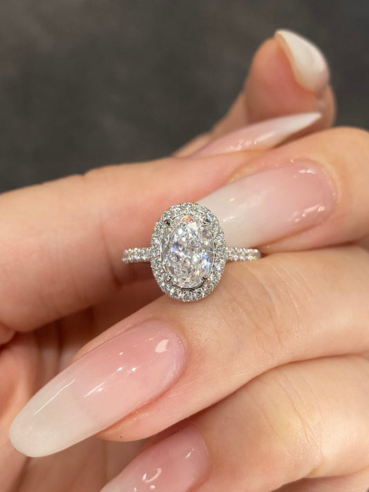 Oval Halo with Side Diamond Ring (ARJS2532)