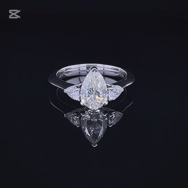 1.50 Carat Classic Pear-Shaped Tripology Three-Stone Ring